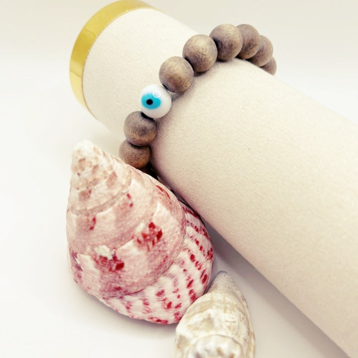 The Evil Eye Wood Bracelet: Rose Quartz