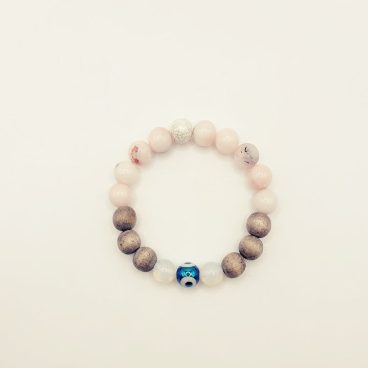 Bracelet en bois contre le mauvais œil : perle en opalite de lune et quartz rose
