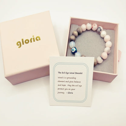 Bracelet en bois contre le mauvais œil : perle en opalite de lune et quartz rose