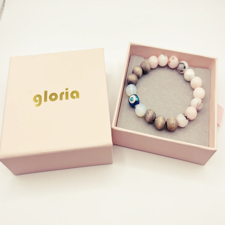 Bracelet en bois contre le mauvais œil : perle en opalite de lune et quartz rose